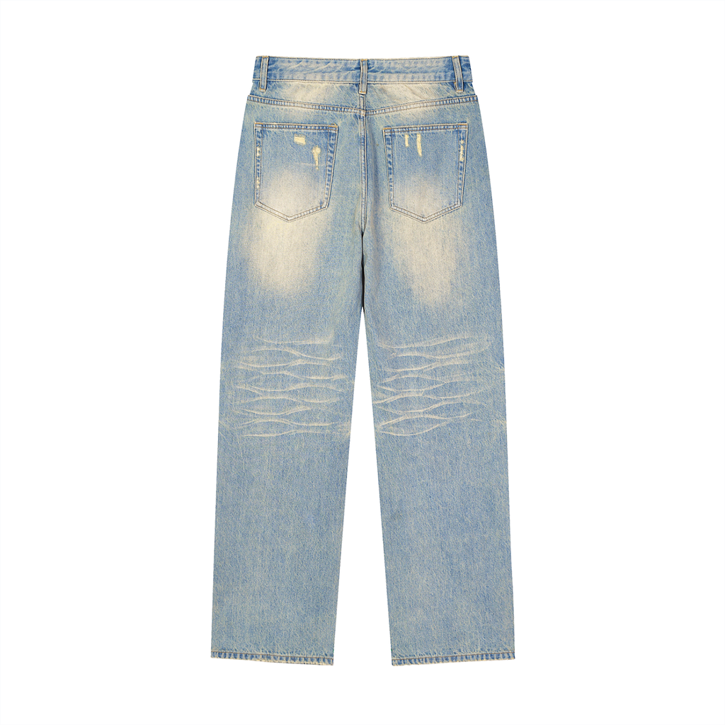 AERIXN Sun-Faded Raw Hem Denim Jeans — Signature Detail